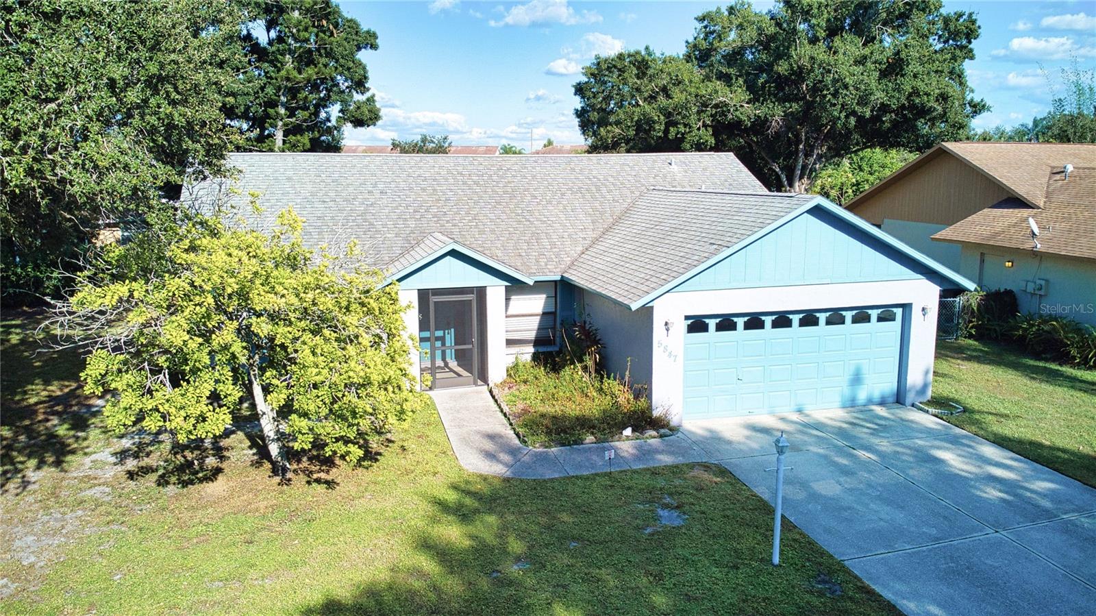 One or more photo(s) has been virtually staged. Sarasota fixer-upper with 3 bedrooms, 2 baths and a screened lanai. Split-bedroom plan and easy one-story layout with living/dining combo and sliders to the lanai for indoor-outdoor living. Needs updates, including a new roof—bring your vision. AC 2017. The adjacent lot has beautiful oak trees and no house, adding privacy. HOA with low fees. Convenient location near shopping (UTC) and restaurants. CASH ONLY, Sold as-is; great opportunity to renovate and build equity.
