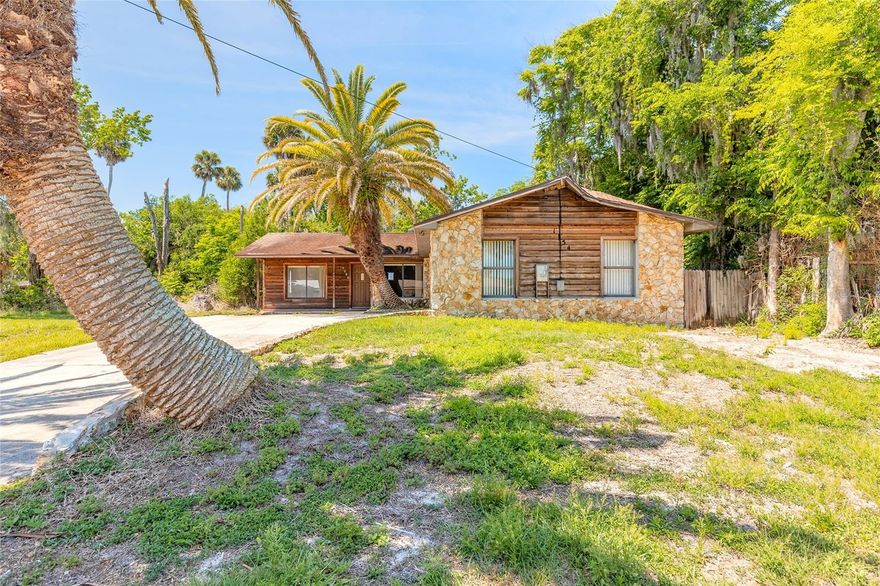 This 3-bedroom, 2-bath ranch offers a functional 1,236 sq. ft floor plan, a 2-car garage, and it sits on a deep .20-acre lot with plenty of room to create an ideal outdoor space. Inside, the family room features a striking coquina fireplace which is an incredible design element ready to be transformed into a stunning focal point. The split-bedroom layout provides added privacy for the primary suite, and all bedrooms offer generous closet space. With its unique architectural features, this home presents a fantastic rehab opportunity to customize and design a space that truly reflects your own style. Conveniently located with quick access to public transportation and major highways, commuting and daily errands are a breeze. If you've been searching for a home where you can bring your vision to life, this is one you won't want to miss. Best suited for cash or rehab financing, schedule your showing today and explore the possibilities. There are no warranties expressed or implied.  All measurements are approximate.  Sq. footage received from the tax rolls.  All information recorded in the MLS is intended to be accurate but can not be guaranteed.  Buyer should check zoning for rental restriction. Subject to seller addendum and All offers are subject to OFAC clearance. - This property is eligible under the First Look Initiative.  All Owner Occupant offers will be responded to after 7 days on the market and Investor offers will be responded to after 30 days. All offers can be submitted during the First Look period.