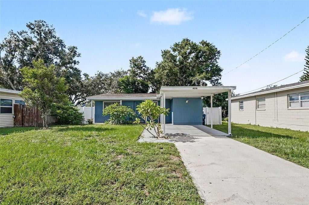 Photo of 4516 W Paxton Avenue, Tampa, FL 33611 (MLS # O6433498)