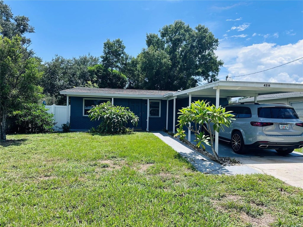 Photo of 4516 W Paxton Avenue, Tampa, FL 33611 (MLS # O6433498)