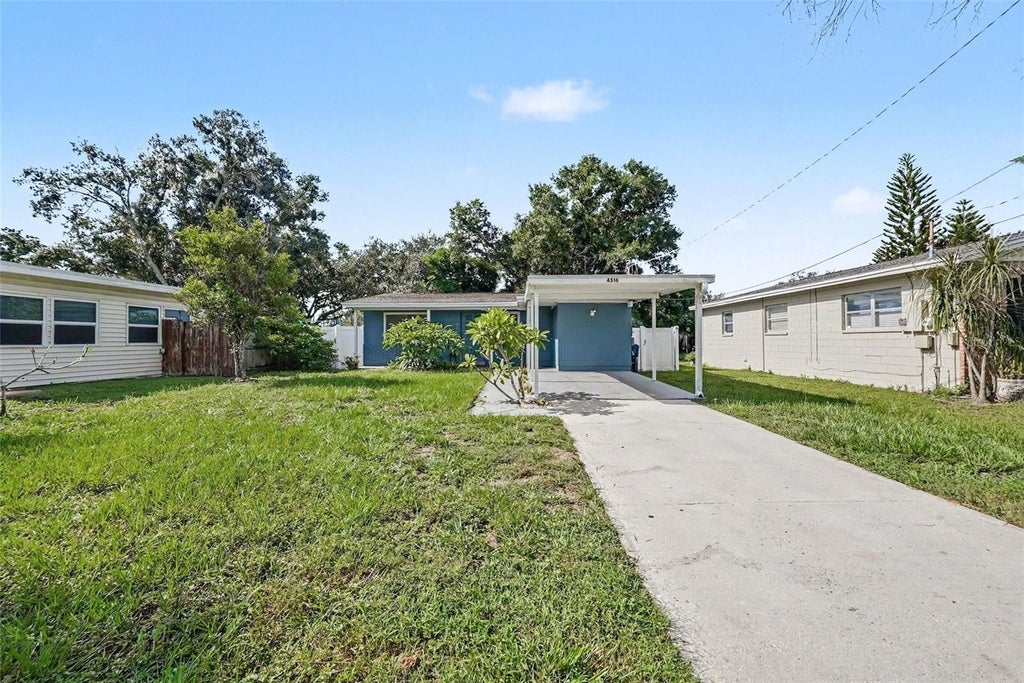 Photo of 4516 W Paxton Avenue, Tampa, FL 33611 (MLS # O6433498)