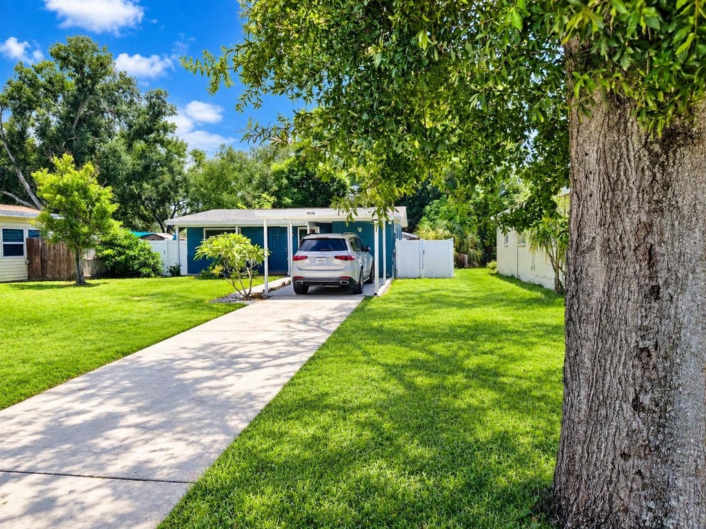 Photo of 4516 W Paxton Avenue, Tampa, FL 33611 (MLS # O6433498)