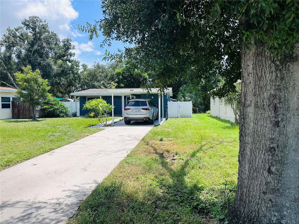Photo of 4516 W Paxton Avenue, Tampa, FL 33611 (MLS # O6433498)
