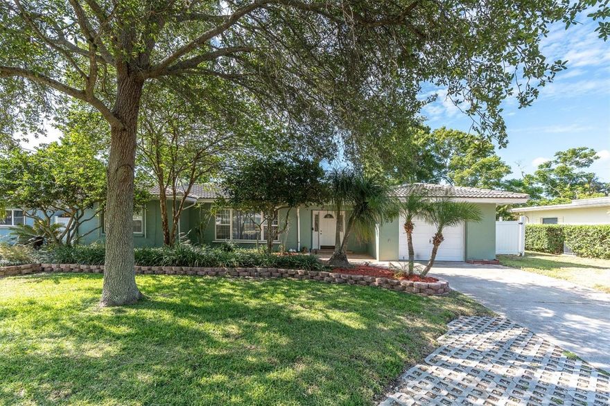 Beautifully updated 3-bedroom, 2-bath home located in desirable Belleair Bluffs, just minutes from pristine Gulf beaches, golf courses, shopping, and entertainment.
This home features a well-appointed kitchen with maple cabinetry in a rich cherry finish, granite countertops, an undermount stainless steel sink, and convenient corner lazy Susan's. All stainless steel appliances are included, highlighted by a propane-fueled double oven range connected to a 250-gallon underground propane tank. Ample storage is available throughout, including a spacious center island.
Energy efficiency and durability are standout features, with double-pane argon-filled vinyl windows (installed in 2003), hurricane panels for windows and doors, and owned 4.5 kW solar panels. The home also includes spray foam insulation in the roof deck (2011), contributing to enhanced energy performance and approximately $500 in annual insurance savings. The roof was retrofitted with hurricane clips in 2017, with all rafters strapped for additional storm protection and further insurance benefits.
Interior finishes include bamboo flooring throughout most of the home, with vinyl flooring in the kitchen and recreation room. The expansive 448 sq ft primary suite addition (2013) offers a private retreat, complete with its own high-efficiency 19 SEER mini-split system, extra insulation, three large walk-in closets, and a beautifully designed walk-in shower with glass enclosure. This addition also features a standing seam metal roof and energy-efficient windows and doors.
Outdoor living is exceptional, with a 400 sq ft covered and screened patio (2016), an additional 12 x 20 open patio, and an impact-rated sliding glass door ( 2018 ) from the recreation room providing seamless access to the rear screened in Patio .
Additional highlights include:
Water Heater 2026 
 Electrical Panel 2002
HVAC system (2018)
Flat roof replacement (2026)
Wired for a whole-home generator and plumbed for propane. 
30 amp RV hook up
RV or trailer / boat storage area. 
This meticulously maintained home offers comfort, efficiency, and peace of mind in a prime location. Schedule your private showing today.