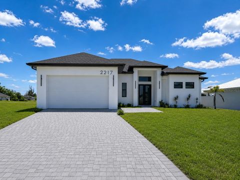 Photo of 2217 NW 37th Place, Cape Coral, FL 33993 (MLS # O6409865)
