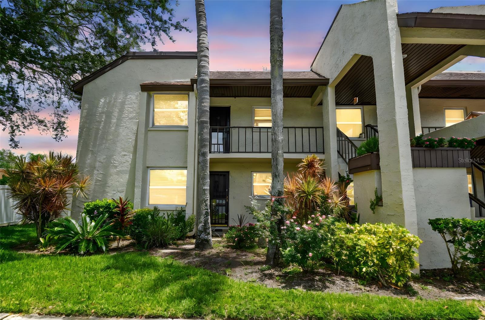 Welcome to this spacious and well-maintained 2-bedroom, 2-bathroom second-floor end-unit condo located in Willowbrook, a quiet and desirable 55+ community conveniently set just off East Bay Drive. Nestled at the back of the complex in Building D, this corner unit offers enhanced privacy and a peaceful atmosphere. Inside, the condo features an open and oversized living and dining area, complete with a cozy alcove ideal for reading, relaxing, or additional seating. The kitchen has been thoughtfully upgraded with quality wood cabinetry, solid surface countertops, and a modern refrigerator with updated features, making it as functional as it is attractive. Hurricane-rated windows have been installed throughout the unit, providing added safety, storm protection, and improved energy efficiency. The spacious primary bedroom includes a walk-in closet, an overhead ceiling fan, and an updated en-suite bathroom with a walk-in shower and modern overhead lighting. The second bedroom offers updated flooring and its own ceiling fan, while the guest bathroom has been enhanced with stylish finishes and a convenient step-in shower. Additional improvements include a new electrical panel and hot water tank installed in 2022, tile flooring throughout the main living areas, an HVAC system installed approximately five years ago, and ceiling fans in every room to ensure year-round comfort. A designated storage closet is located on the ground floor, and assigned parking space #39 is directly in front of the building for easy access. A community laundry room is conveniently located on the same floor as the unit. Residents of Willowbrook enjoy access to a heated community pool and a shuffleboard court, with nearby amenities including Largo Central Park, the Largo Public Library, Highland Recreation Complex, and the Aquatic Center. Just a short drive away, the award-winning Clearwater Beach offers white sand and stunning Gulf views. This well-appointed condo offers a low-maintenance lifestyle in a prime location—schedule your private showing today.