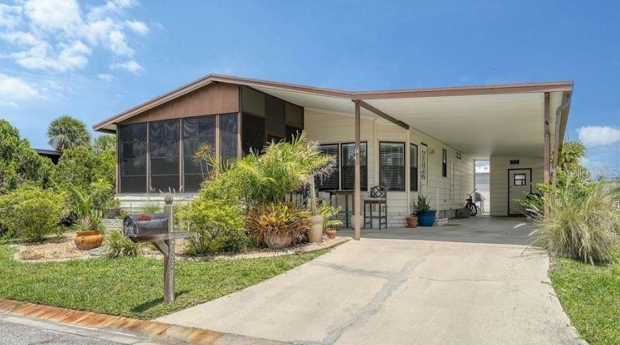 Welcome to this TURNKEY 2 bedroom, 2 bathroom manufactured home with a carport with an included Golf Cart, located in the active 55+ Harbor Cove community in North Port. CLICK ON THE VIRTUAL TOUR LINK 1 FOR THE VIDEO AND VIRTUAL LINK 2 FOR THE 3D TOUR. This bright and airy home features luxury vinyl flooring throughout, and large windows that fill the space with natural light. The open living and dining area is ideal for entertaining friends and family. The kitchen offers all appliances, ample counter space, and plenty of cabinetry for storage. The primary suite includes a walk-in closet and a private bathroom with a single-sink vanity and walk-in shower. The guest bedroom has a built-in closet with a conveniently located nearby bathroom. A Florida room expands your living and entertaining space, while a small back patio provides the perfect spot for grilling or enjoying the outdoors. A storage shed located under the carport houses the laundry area and offers additional storage for all your needs. Harbor Cove is an active resident-owned WATERFRONT community with a clubhouse, two community pools, an exercise gym, shuffleboard & bocce ball courts, a wood workshop, a private marina, and TONS of resident social events to keep you active year-round! Conveniently located near US 41 for easy access to local shopping, dining, LIVE entertainment, and award-winning beaches. Schedule your private showing TODAY!