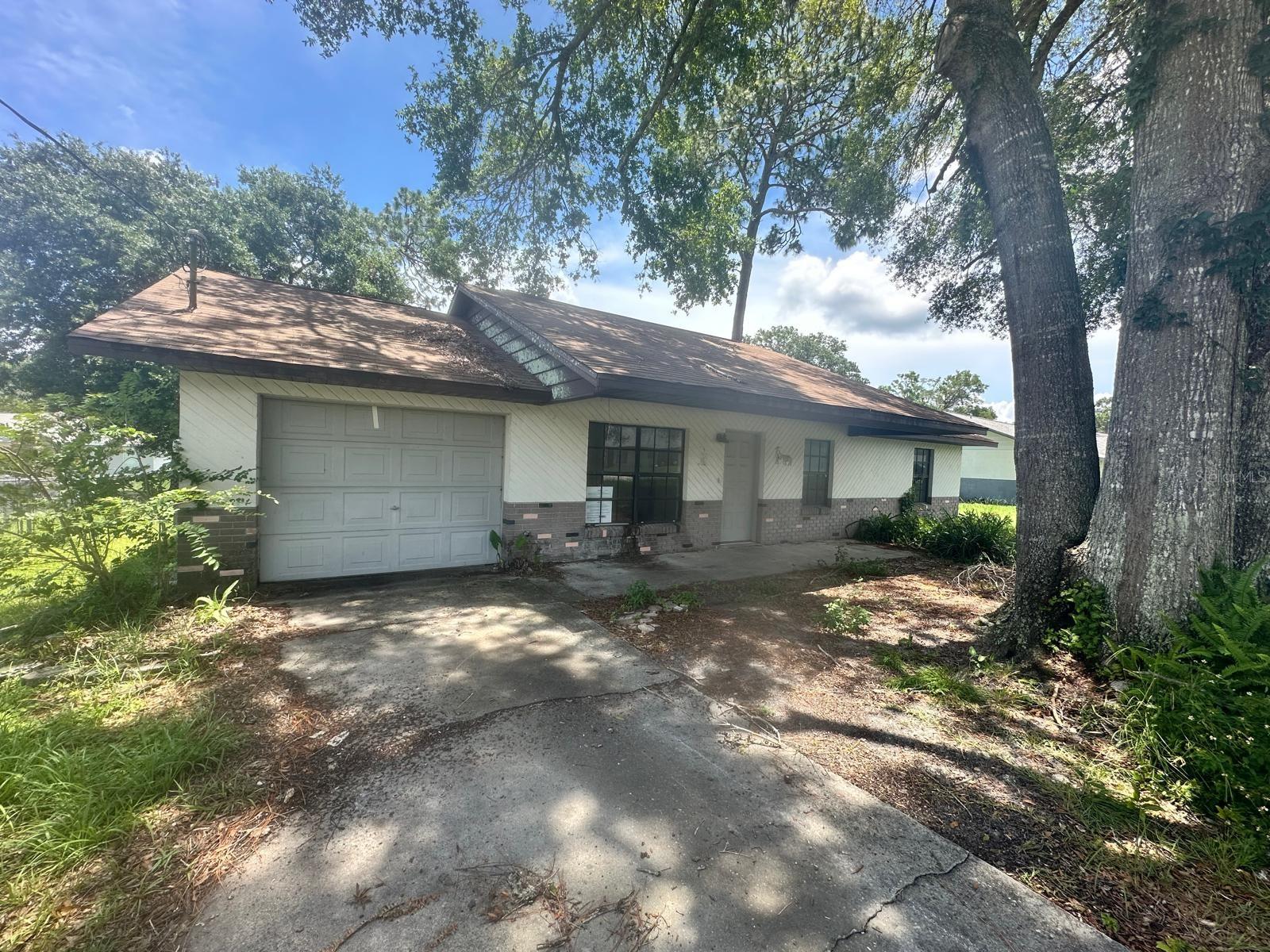 Auction Property. Take homeownership to the next level with this incredible investment opportunity. This 3 bedroom and 2 bathroom single family home is less than 30 minutes drive to the city of Ocala Florida. Consider the added potential and value once this property is fully renovated and customized to your specifications and desirability. Nothing can beat the rural feel and location that this home offers while enjoying the sunsets from your front porch. With a practical floor plan, this home offers many options for a comfortable living space. Think of all the possibilities that you can create with this home. Make the move and consider this home today!