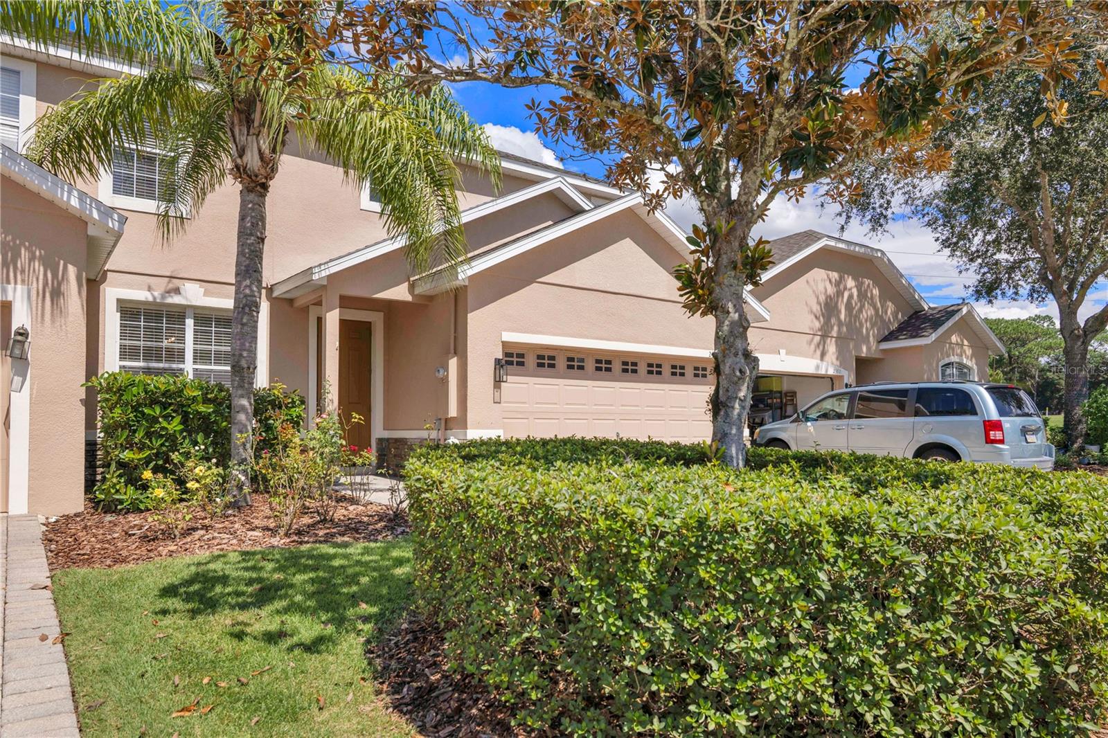 Welcome to this beautifully updated townhome in the secure, guard-gated community of Sorrento Springs. Offering over 2,500 square feet of well-designed living space, this two-story residence features 4 bedrooms, 3.5 baths, and a spacious 2-car garage. The primary suite is conveniently located on the main level and offers a luxurious retreat with two walk-in closets, dual sinks, a soaking tub, and a separate shower. Downstairs showcases brand-new luxury vinyl plank flooring, fresh paint, new high baseboards, and a modern electric fireplace that provides both heat and ambiance. The upgraded kitchen boasts quartz countertops, a matching quartz waterfall island, soft-close cabinets, stainless steel appliances, a farmhouse sink, and all-new lighting throughout. Upstairs, you’ll find a massive bonus room that can serve as a theater, playroom, or additional family room, along with three spacious bedrooms, two bathrooms, and new window blinds. Further recent updates include a new roof (2024) and fully upgraded bathrooms. Outside, enjoy a private backyard with no rear neighbors and a beautifully paved patio, perfect for entertaining.
Sorrento Springs offers a resort-style lifestyle with amenities such as a clubhouse, fitness center, pool, playground, tennis courts, basketball court, and pavilion. For golf enthusiasts, the community is also home to the 18-hole Eagle Dunes Golf Course, where memberships are available separately. HOA services include lawn care, exterior building maintenance, and irrigation, providing a low-maintenance lifestyle with more time for leisure. Ideally located just minutes from Mount Dora, Sanford, and Lake Mary, this home combines elegant charm with convenient access to shopping, dining, and cultural destinations. Don’t miss the chance to make this stunning home yours—schedule your private showing today!