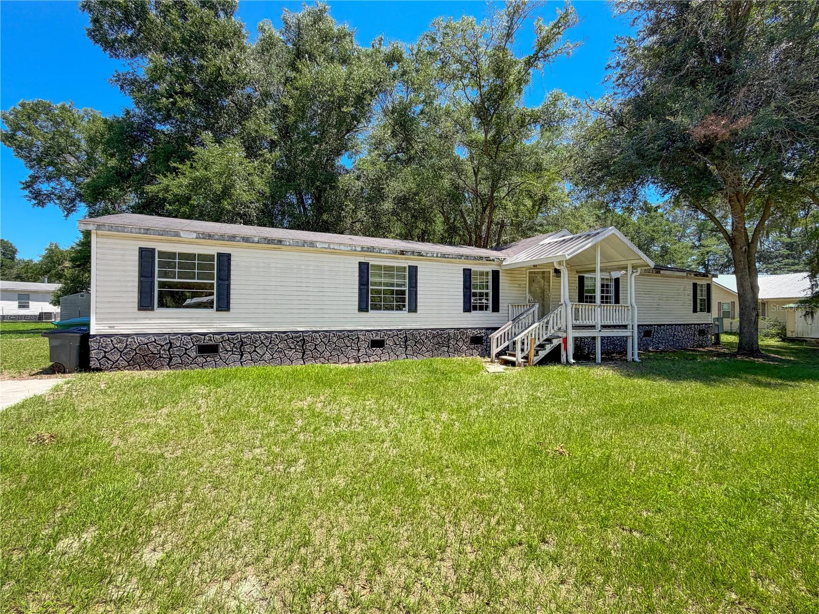 Photo 1 of 35 — 303 NW KENSINGTON LANE, LAKE CITY, FL 32055