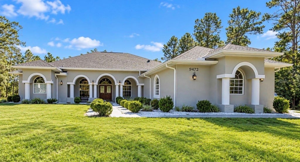 Photo of 9472 Whisper Ridge Trail, Weeki Wachee, FL 34613 (MLS # W7890383)