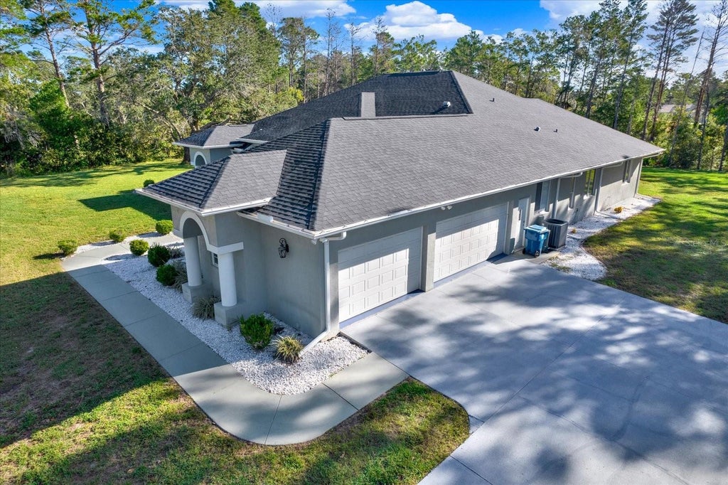 Photo of 9472 Whisper Ridge Trail, Weeki Wachee, FL 34613 (MLS # W7890383)