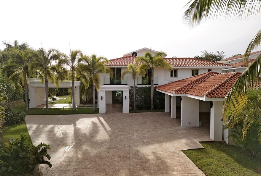 Discover your dream home in the heart of paradise! This stunning, sun-drenched 6-bedroom, 7.5-bathroom property spans over 8,704 sq. ft. and is nestled in the midst of a lush, tropical community. With its open and contemporary design, cathedral ceilings, and elegant tiled floors, this home exudes luxury. The gourmet kitchen is a chef's delight, equipped with high-end appliances, while the expansive pool is the perfect place to unwind and entertain. Plus, you'll have peace of mind with a gas power generator and a water cistern to keep you comfortable in any situation.

Located within the Dorado Beach Resort, since it is a 2,000-acre natural reserve most of the communities are 1-3 miles away from the beach and Hotel. This being said, the entire resort is interconnected via golf cart trails, meaning that you can have easy access (walking or in golf cart) to the different communities and amenities within this Resort. Owner is open to rent at $40,000 monthly.