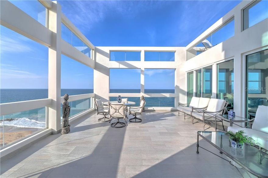 Rarely available, ready to immediately move in and to enjoy panoramic ocean views from this beautifully renovated, centrally air-conditioned three/four bedroom 4900 sq. ft duplex. Located atop one of CoBe’s premier condominium buildings, this corner duplex features grand double height ceiling, 41’ x19’ living and dining space, 2/3 bedrooms on first level, with large outdoor entertaining space sitting directly on the ocean. Upper level features master suite, home office, large walk in closets and private terrace.

Acquamarina condominium is a full-service building in the heart of CoBe with direct beach access. The building is among the most distinguished addresses on Ashford Avenue in close proximity to everything CoBe has to offer. The condominium boasts resort-like grounds complete with a beachfront swimming pool and gym. Walking distance to top restaurants, hotels, shopping and entertainment venues.