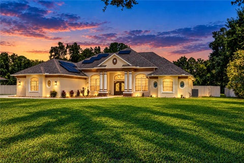 Photo of 7136 Quail Hollow Boulevard, Wesley Chapel, FL 33544 (MLS # TB8550133)