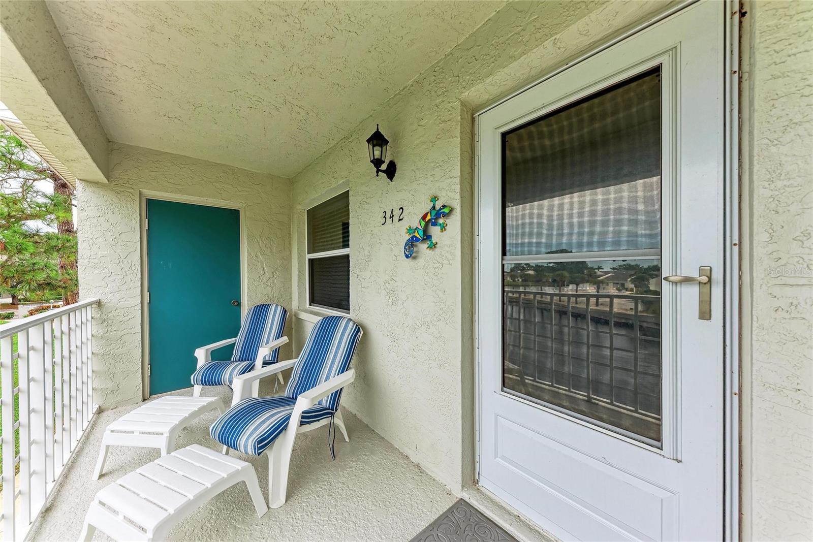 Don’t miss out on this great location!. Just minutes to beautiful Anna Maria Island! This adorable second floor, 2 bedroom 2 bath condo has a coastal cottage feel and offers plenty of space for guests! The Master Bedroom features a walk-in closet, and large bathroom with dual vanities, and walk-in /shower. The 2nd bedroom features a private enclosed lanai to relax on. The kitchen is well appointed for the chef in the family, with a pantry, and eat in space. This condo is a corner unit and offers waterway views. HOA application and application fee required. Water, lawn care, trash, cable, internet and carport parking space included. Perico Island has amazing amenities that include a heated pool, tennis court, fitness center, clubhouse, steam room, and beautiful grounds and landscaping that offers a bird sanctuary. Bike or walk to several parks including Robinson Preserve, Neal Preserve, and Perico Preserve, or a short drive or bike ride to highly desirable Anna Maria Island with pristine beaches! This condo is in close proximity to Downtown Bradenton, Cortez, Longboat Key, and a short drive to Sarasota, St Armands Circle, and St Pete. 2 month minimum rental, sorry no pets are permitted.