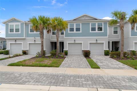 Photo of 31449 Woodland Race Loop, Wesley Chapel, FL 33545 (MLS # A4701360)
