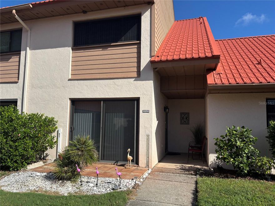 This furnished rental can be an annual rental at $2150.00 or a seasonal rental at $3250.00. Don't miss this south Sarasota hidden community off of Clark Road, drive back this winding road to the back of the community to enjoy lake views with lots of wildlife to explore. Nice big Florida oaks and palm trees with grassy areas and paths to walk along the water side. This townhouse is turnkey furnished with 2 upstairs ensuite both with queen beds and walk in showers. The master bedroom is filled with lots of natural light from the  sliding glass doors that lead out to a large sun room with views of greenery and water canal. Downstairs is a nice sized living room with screened in lanai attached. The unit has great storage with inside laundry room and storage room. Kitchen has granite counters with real wood cabinets and pass through to living room with bar stools. A front sperate dinning room with lots of light is great for breakfast or dinner gatherings. This community offers free cable TV, community pool, tennis Courts, basketball hoop and walking trails with water views.