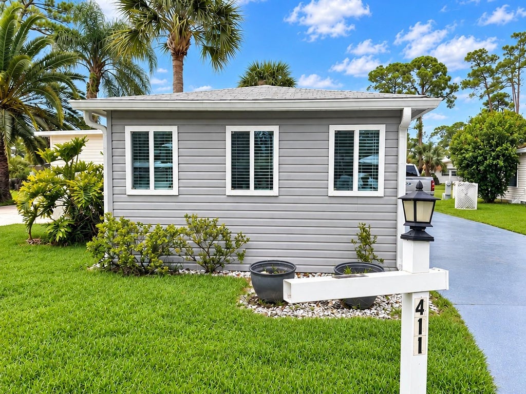 Photo of 411 Oak Cove Road, Titusville, FL 32780 (MLS # FC321343)