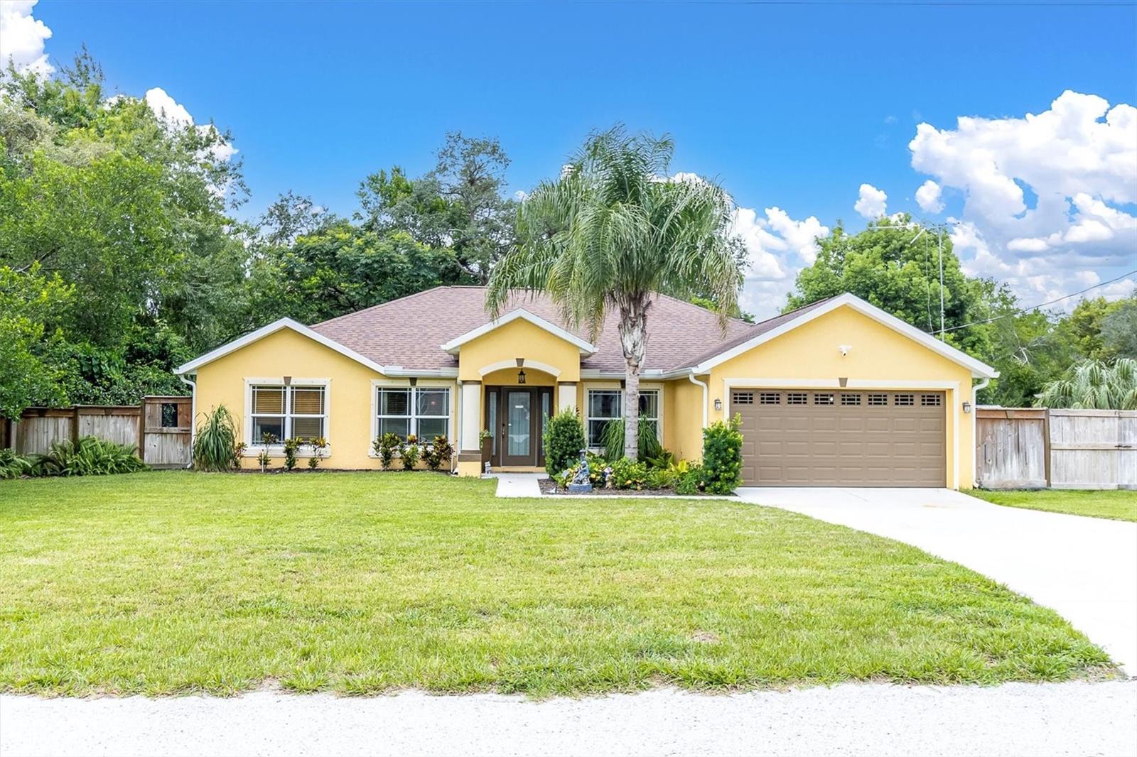 HURRY TO THIS AWESOME 3/2/2 ON 1/3 ACRE WOODED LOT BEFORE IT IS GONE! CATHEDRAL CEILINGS SOAR OVER & ENHANCE THE LARGE OPEN FLOOR PLAN... FORMAL LIVING ROOM, DINNG ROOM AND ONTO THE LARGE FAMILY ROOM. THE KITCHEN IS LINED WITH CABINETS TOPPED BY GLEAMING GRANITE APPOINTED WITH STAINLESS APPLIANCES! THE BREAKFAST COUNTER BAR OPENS TO THE FAMILY ROOM JUST PERFECT FOR ENTERTAINING! THE SPLIT FLOOR PLAN GIVES MAXIMUM PRIVACY TO THE PRIMARY SUITE, IT FEATURES A COVE CEILING AND EVERYONE'S FAVORITE DUAL WALK IN CLOSETS, DUAL SINKS AND A GORGEOUS WALK IN SHOWER! BEDROOMS 2 & 3 ARE A GENEROUS SIZE WITH PLENTY OF CLOSET SPACE. CATCH THE BREEZES ON YOUR SCREENED PORCH THAT OVERLOOKS THE LUSH WOODED YARD! GOT A HOBBY? THE GOOD SIZED SHED IS SO HANDY AND HAS ELECTRIC! THIS FABULOUS HOME HAS A TRANSFERRABLE TERMITE AND HOME WARRANTIES, THE SEPTIC RECENTLY EMPTIED, IT IS FENCED WITH A DOUBLE GATE, NO HOA TO WORRY ABOUT AND THE SELLER SAYS IT IS NOT IN A FLOOD ZONE! THIS IS A PERFECT PACKAGE! RUN TO THIS ONE! HESITATE....AND YOU'LL BE TOO LATE!