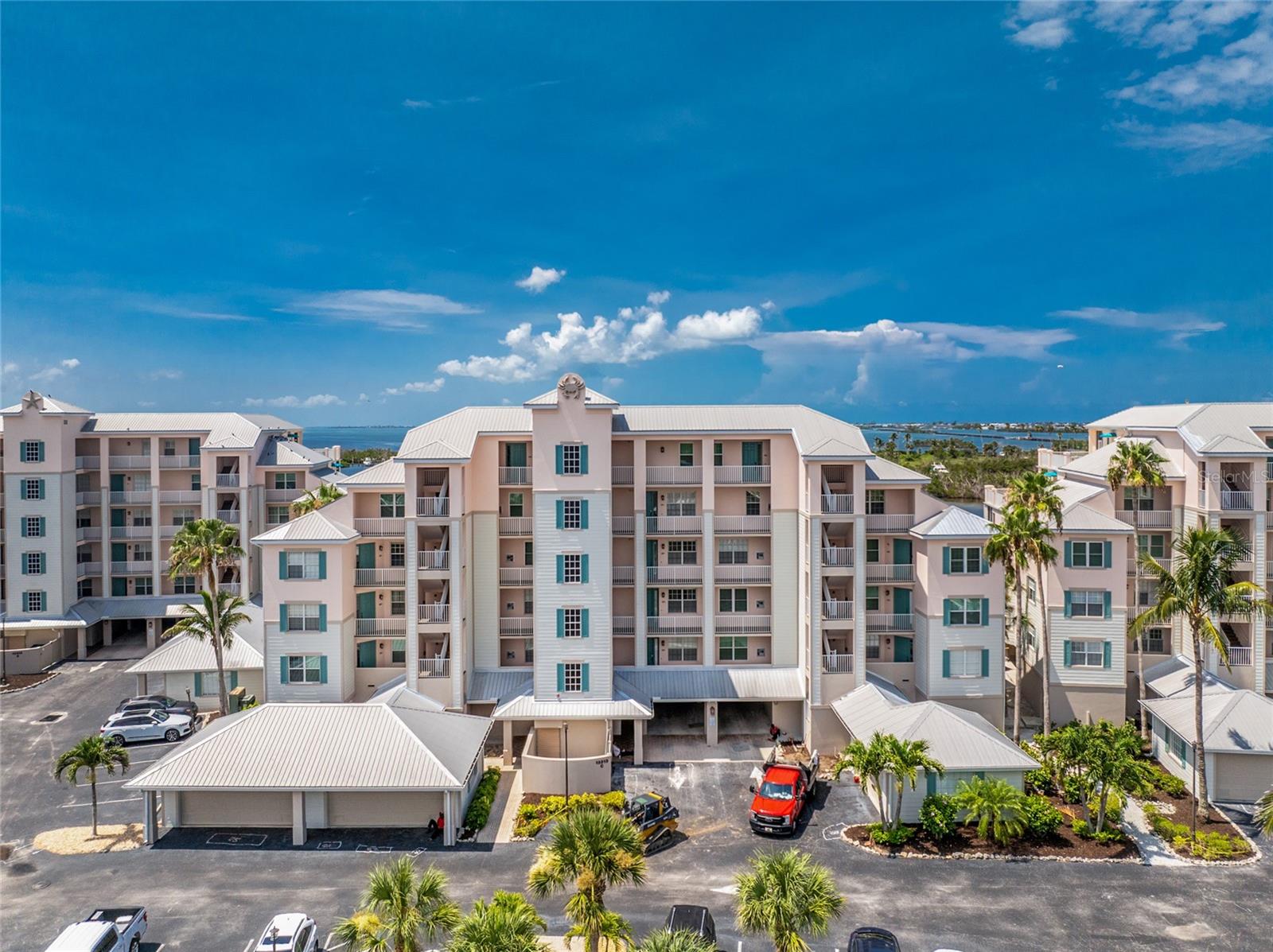 WATERFRONT 3 Bedroom 2 Bath End Units rarely come available!! Plus a PRIVATE GARAGE IN BOCA VISTA HARBOR! This condo has amazing views of the Intercoastal Waterway, and of the marina. Open dining room and living space with gorgeous water views. The master bedroom has Stunning water views of the Intercoastal Waterway and Boca Grande, Kitchen equipped with wood cabinets soft close, Stainless Steel appliances, Granite and Onyx countertops. Master bathroom enjoy a Separate Soak Tub and Fully Tiled extra large Walk in Shower, Dual sinks with granite countertops and 2 walk in closets. Home is complete with Porcelain Tile floors and Crown Moulding in every room. The guest bedroom and second bath makeup a private en-suite for guests Tucked behind a privacy door. Guest bath completely remodeled with Large walkin Shower and Granite countertops. Electric Hurricane shutters for the lanai, plantation shutters throughout, a private enclosed garage on 1st floor! The community offers boat docks at an additional fee, and is located adjacent to Gasparilla Marina with fuel, service and supplies. The 7 mile Pioneer Trail is conveniently located across the street for walkers, runners and bikers! Boca Vista Harbor amenities include a gated entrance, heated pool and spa, and a tennis / pickleball court. Located 5 minutes from Boca Grande and its beautiful beaches, restaurants and shopping minutes away. Schedule a Tour today to see this Gorgeous Unit!