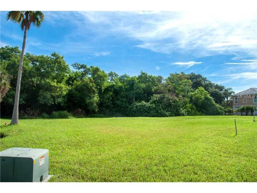 SELLER EXTREMELY MOTIVATED!!! Don't settle!! Build your own Luxury Home on this large (116x122) parcel of land in fabulous Pasadena Yacht and Country Club. This prime lot has a conservation area in the back and a pond on one side and is in the Bay Estates neighborhood. PYCC is Pinellas County's most prestigious gated community with an 18 hole championship golf course, marina, tennis courts, fitness center, clubhouse with Olympic sized swimming pool, and gorgeous Luxury Homes. This community is close to schools, shopping, restaurants, downtown, interstate, Clearwater, Tampa, and airports. See attached survey and elevation certificate. We have builder referrals available if needed. Seller Financing Available. Start building your DREAM HOME TODAY!