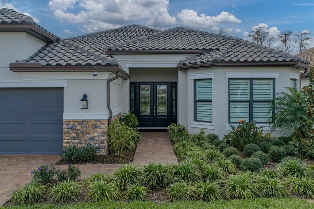 Photo of 4920 Freccia Loop, Wesley Chapel, FL 33543 (MLS # TB8465731)