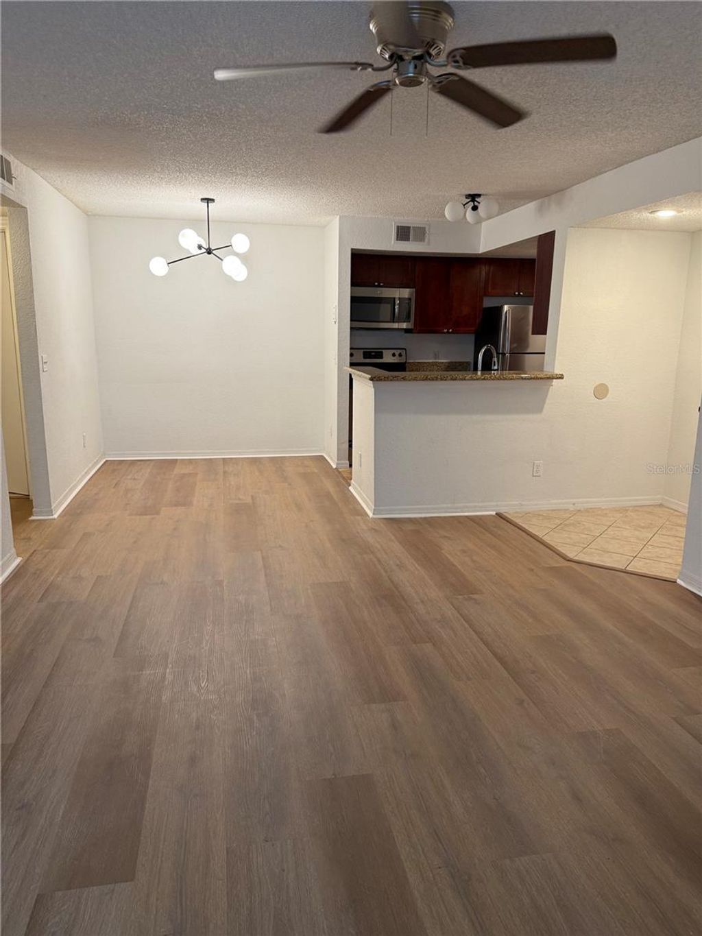 Photo of 5120 Conroy Road #523, Orlando, FL 32811 (MLS # O6384976)