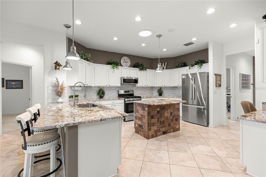 Photo of 13973 SE 96th Circle, Summerfield, FL 34491 (MLS # OM714609)