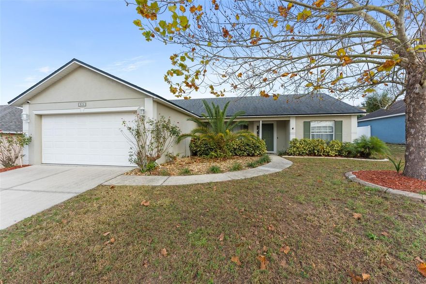 **This house comes with a REDUCED RATE through the seller's preferred lender. This is a lender-paid rate buydown that reduces the buyer's interest rate and monthly payment.**

Welcome to 806 Breezy Lake Way, a charming and well-maintained home located in the desirable Minneola community. This 3 bedroom, 2 bathroom residence offers 1,550 heated square feet of thoughtfully designed living space with a comfortable and functional layout. A welcoming front porch creates great curb appeal and invites you inside to bright, open living areas that are ideal for both everyday living and entertaining.

The kitchen and dining areas connect seamlessly to the main living space, making gatherings easy and enjoyable. Step outside to the screened rear patio, a perfect place to relax, unwind, or enjoy your morning coffee while overlooking the private fenced yard, which offers plenty of space for outdoor activities, pets, or gardening.

Additional features include a 2 car garage for ample storage and parking, along with a peaceful neighborhood atmosphere. Conveniently located near shopping, dining, schools, parks, and major roadways, this home provides easy access to surrounding areas while maintaining a quiet residential feel. A wonderful opportunity to enjoy comfortable living in the heart of Minneola.