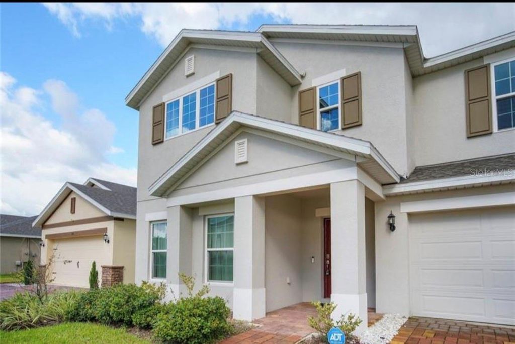 Photo of 244 Hamlet Loop, Davenport, FL 33837 (MLS # G5112599)