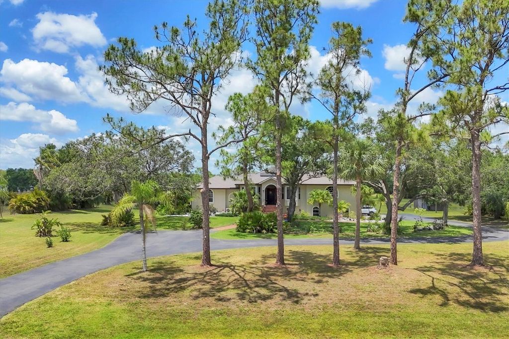 Photo of 6242 Tropicaire Boulevard, North Port, FL 34291 (MLS # C7509815)