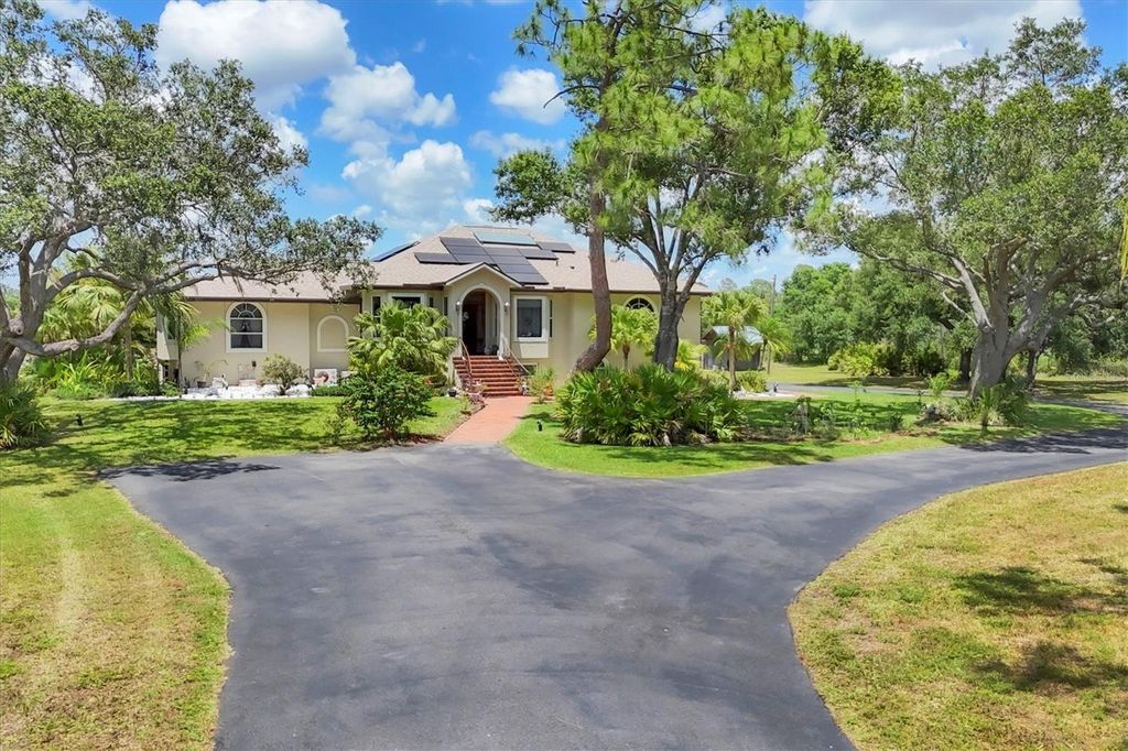 Photo of 6242 Tropicaire Boulevard, North Port, FL 34291 (MLS # C7509815)