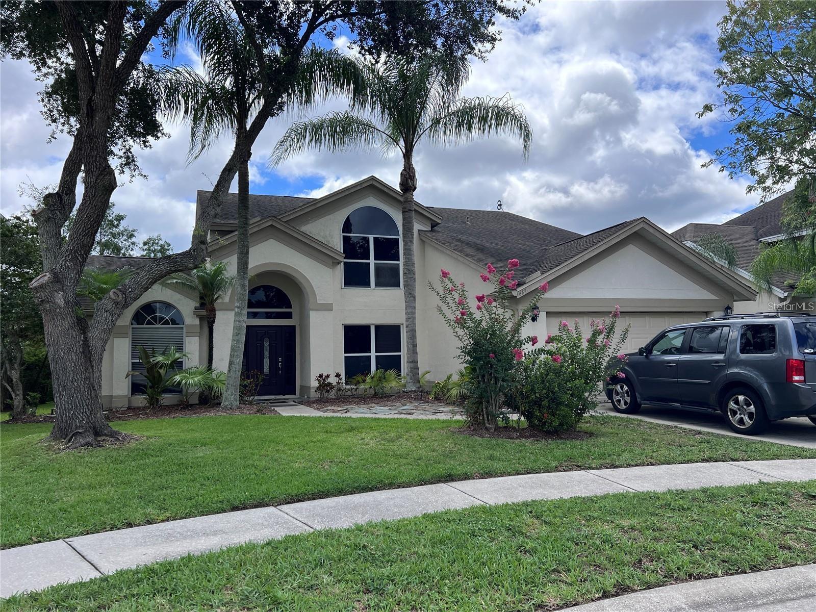 Come explore this beautifully maintained home is located in the highly sought-after Waterford Lakes community on a quiet cul-de-sac, offering stunning waterfront views of a peaceful lake and lush conservation area. Featuring a bright, open floor plan filled with natural light, the home includes a spacious living area that opens to a covered patio, perfect for relaxing or entertaining while enjoying the serene surroundings. The first floor boasts a desirable master suite with an updated bathroom, a generous laundry room, and a convenient half bath. Upstairs, you'll find three additional bedrooms and a fully remodeled full bathroom, offering plenty of space for family or guests. With its prime location just minutes from shopping, dining, and major highways, this home combines comfort, style, and convenience in one of the area's most desirable neighborhoods.