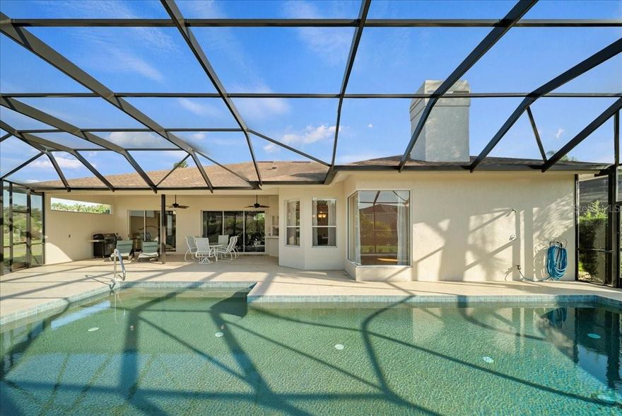 Welcome to your personal slice of paradise in the heart of Peridia Golf & Country Club! This home isn't just a place to live, it's a gateway to the quintessential Florida lifestyle, meticulously cared for and thoughtfully updated. Originally crafted by renowned builder Arthur Rutenberg, this residence stands as a testament to quality design and timeless appeal.

Step inside and feel the warmth as an inviting, open floor plan draws you in, from the expansive living room to the heart of the home: a chef-inspired kitchen, now featuring a new LG refrigerator. Imagine mornings sipping coffee at the cozy breakfast nook overlooking the pool, or evenings gathered around the fireplace in the family room.

The primary suite is a true sanctuary, featuring a spacious walk-in closet and a spa-like en-suite bath with a separate shower and a deep soaking tub, perfect for unwinding. Privacy is a priority here, with a clever split-floor plan that places generous secondary bedrooms on the opposite side, ensuring a comfortable stay for family and friends.

The real showstopper is outside. Your very own tropical oasis awaits, transformed by a brand new, stunning screened lanai (a $55,800 investment!). The pool has been upgraded to a modern, low-maintenance salt system and features a new Pentair heater, filter, and pump—a true gift for anyone who loves to swim. The outdoor living space is a masterpiece, ideal for everything from lively weekend barbecues to peaceful, sun-soaked afternoons. The commitment to quality extends to every detail, from the new landscaping that creates a serene curb appeal to the updated sprinkler system and a durable Pebble-Tech garage floor.

Living in Peridia is a resort experience in itself. From the 18-hole golf course and legendary Tiki bar to a vibrant social calendar filled with community events, this is where neighbors become friends. With a brand new A/C system and updated lighting and receptacles throughout, you can move in with complete peace of mind, knowing all the major and minor updates have been taken care of.

And with beaches, shopping, and dining just minutes away, everything you need is right at your fingertips. Don't just dream of the Florida lifestyle, live it. Your new life at 4321 Presidential Ave E is waiting for you.