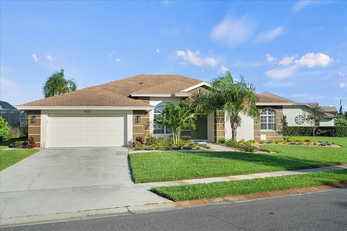 Welcome to your personal slice of paradise in the heart of Peridia Golf & Country Club! This home isn't just a place to live, it's a gateway to the quintessential Florida lifestyle, meticulously cared for and thoughtfully updated. Originally crafted by renowned builder Arthur Rutenberg, this residence stands as a testament to quality design and timeless appeal.
Step inside and feel the warmth as an inviting, open floor plan draws you in, from the expansive living room to the heart of the home: a chef-inspired kitchen, now featuring a new LG refrigerator. Imagine mornings sipping coffee at the cozy breakfast nook overlooking the pool, or evenings gathered around the fireplace in the family room.
The primary suite is a true sanctuary, featuring a spacious walk-in closet and a spa-like en-suite bath with a separate shower and a deep soaking tub, perfect for unwinding. Privacy is a priority here, with a clever split-floor plan that places generous secondary bedrooms on the opposite side, ensuring a comfortable stay for family and friends.
The real showstopper is outside. Your very own tropical oasis awaits, transformed by a brand new, stunning screened lanai (a $55,800 investment!). The pool has been upgraded to a modern, low-maintenance salt system and features a new Pentair heater, filter, and pump—a true gift for anyone who loves to swim. The outdoor living space is a masterpiece, ideal for everything from lively weekend barbecues to peaceful, sun-soaked afternoons. The commitment to quality extends to every detail, from the new landscaping that creates a serene curb appeal to the updated sprinkler system and a durable Pebble-Tech garage floor.
Living in Peridia is a resort experience in itself. From the 18-hole golf course and legendary Tiki bar to a vibrant social calendar filled with community events, this is where neighbors become friends. With a brand new A/C system and updated lighting and receptacles throughout, you can move in with complete peace of mind, knowing all the major and minor updates have been taken care of.
And with beaches, shopping, and dining just minutes away, everything you need is right at your fingertips. Don't just dream of the Florida lifestyle, live it. Your new life at 4321 Presidential Ave E is waiting for you.