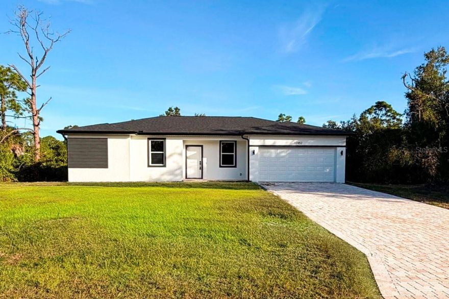 AMAZING home has all the extras you have been looking for, including granite countertops, stainless steel appliances, with shaker kitchen cabinets with 42" uppers, fully tiled shower and tub surrounds, and super-durable luxury vinyl plank flooring throughout. The outside features an upgraded brick paver service walk and driveway, as well as a new fully sodded yard. Smart energy-saving features like highly efficient water heaters and mechanicals, Low-E windows, and low-flow fixtures will keep electricity bills low. The spacious open floor plan allows ample space for entertaining with an open concept Kitchen/Great Room and multiple dining areas including a breezy covered lanai. Make your appointment to view it now!