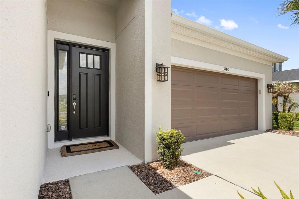 Photo of 33410 Castaway Loop, Wesley Chapel, FL 33543 (MLS # TB8500902)