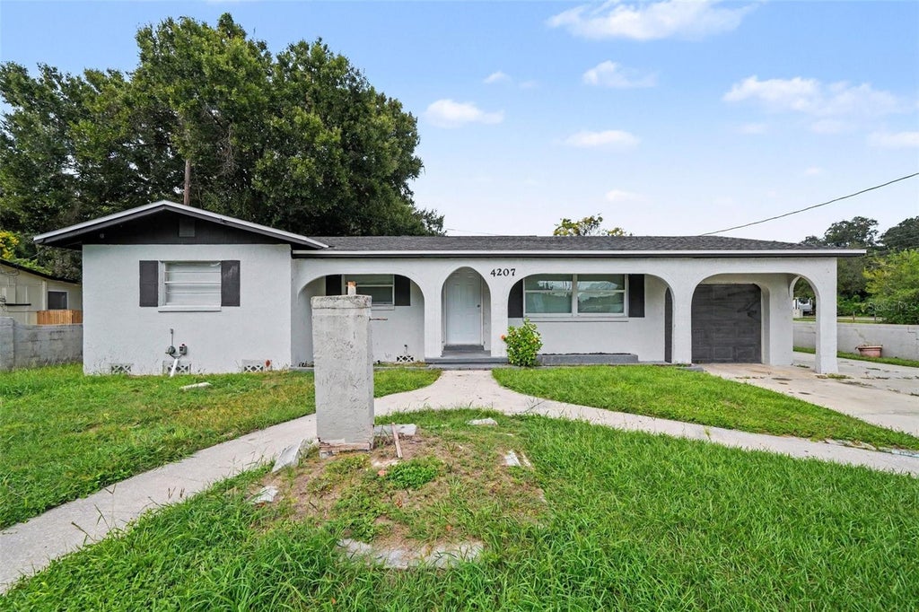 Photo of 4207 Wd Judge Drive #W, Orlando, FL 32808 (MLS # O6445772)
