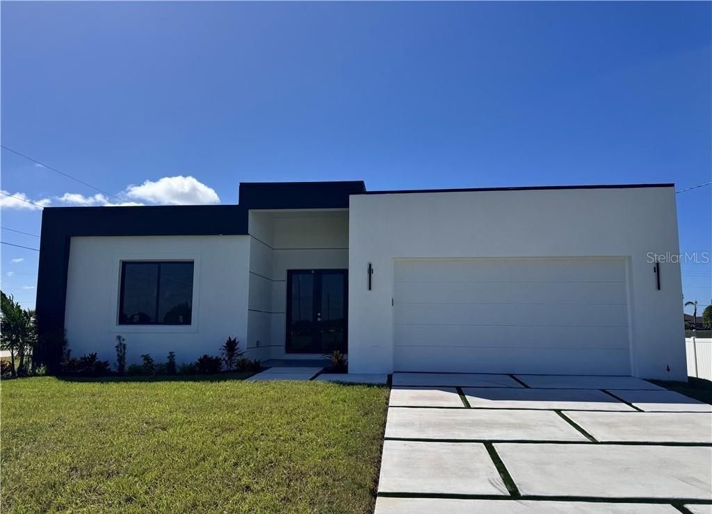 Photo of 4002 NW 38th Street, Cape Coral, FL 33993 (MLS # O6355092)