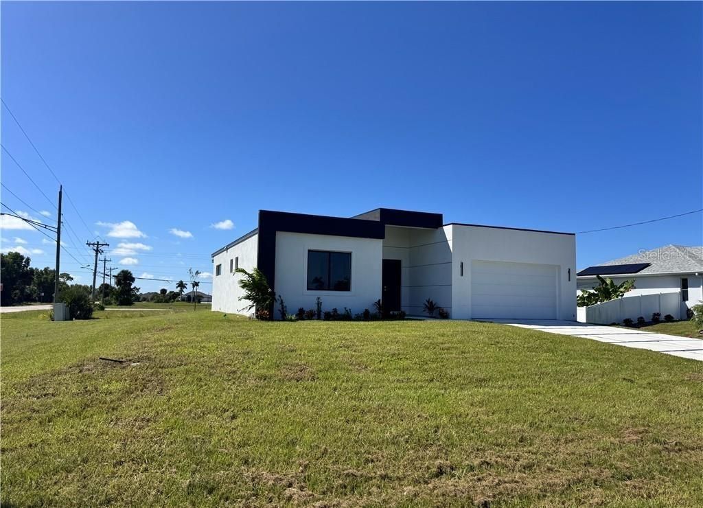 Photo of 4002 NW 38th Street, Cape Coral, FL 33993 (MLS # O6355092)
