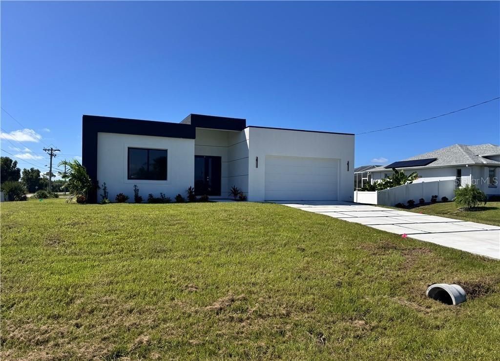 Photo of 4002 NW 38th Street, Cape Coral, FL 33993 (MLS # O6355092)