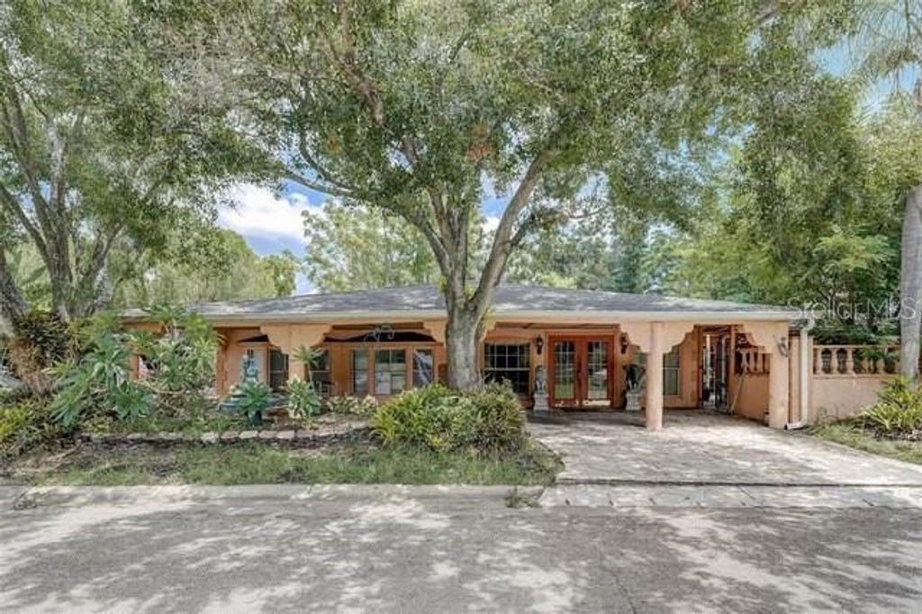 Photo of 4601 Burkett Circle, Tampa, FL 33634 (MLS # TB8419458)