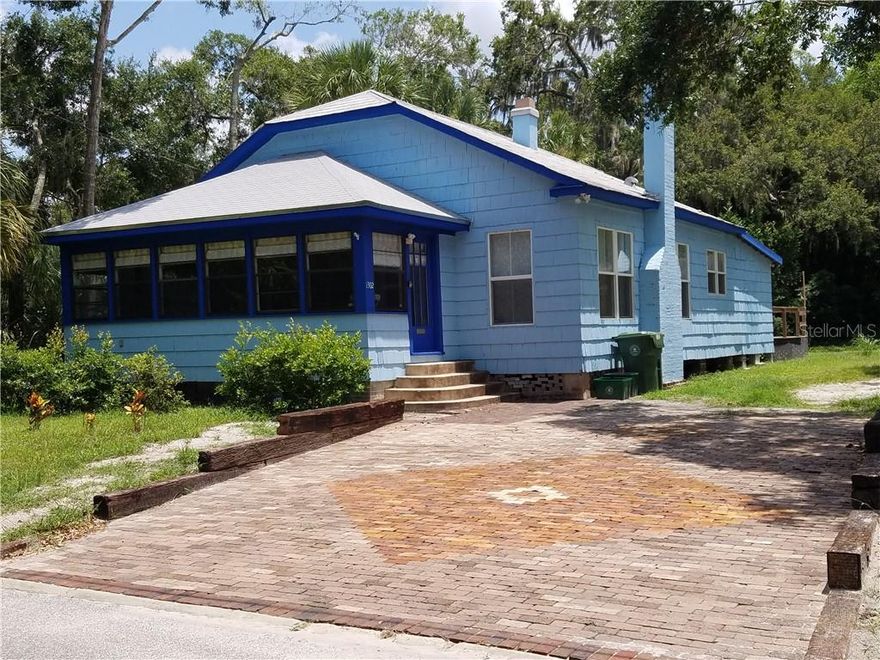 Nestled in a lush green Oak Hammock, across the street from the Manatee River and on the edge of the historic downtown district, this deceptively spacious historic home has charm in abundance as well as the necessary modern conveniences.Built in the 1880-1890s, extensively remodeled in the 1920s, and completely remodeled again throughout 2015-16.Guests describe the cottage as a"Home away from Home".Master bedroom with California King bed and a 2nd bedroom with a Queen bed.Fully remodeled and equipped kitchen: granite countertops, modern appliances including dishwasher. Kitchen leads to separate sitting area, dining area, and a laundry room and half bath. Main living room retains 1920s charm:chandeliers; original fireplace,doors and wood floors. Television, telephone,dvd player and WIFI with high speed internet are included. Front sun room has rustic coastal charm: original dutch siding showcases historic  architecture; vaulted ceilings, plantation fan; cosy couch to sit, relax and enjoy the river view. The rear deck has furniture and a gas BBQ for outdoor cooking and dining, enjoy views over the neighboring lush oak hammock of the Historic Mineral Spring Park. The Manatee Historic Village and other historic houses are 2 blocks away. Local cafes, bars, restaurants, shops, Manatee Memorial Hospital, theatre, museums, attractions like planetarium and riverwalk, and Historic Downtown with its Farmers market, are all within 5 miles. Come enjoy all that Florida has to offer starting as low as $100 a night.