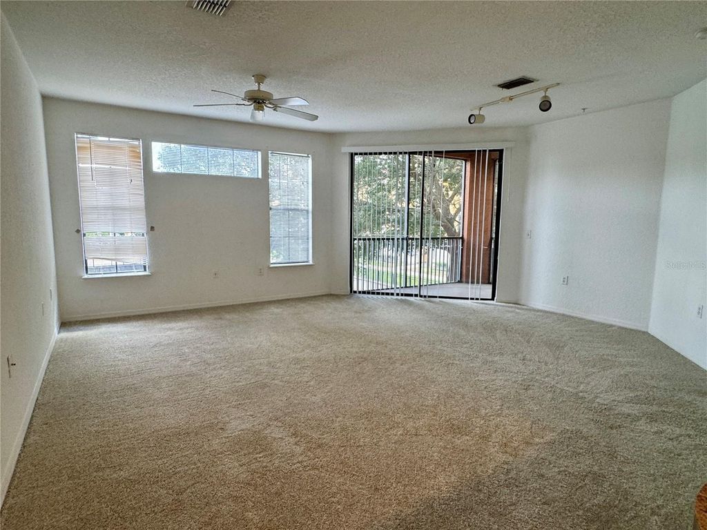 Photo of 6149 Metrowest Boulevard #208, Orlando, FL 32835 (MLS # O6414662)