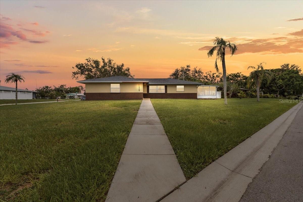 ** STUNNING SINGLE FAMILY HOME WITH MODERN UPGRADES AND A VERSATILE IN-LAW SUITE! ** Experience modern sophistication in this completely and beautifully renovated home, perfectly positioned on a desirable corner lot in the highly sought after Casa Del Sol. The open-concept gourmet kitchen, complete with an oversized island and all-new stainless steel appliances, was thoughtfully designed for both cooking and conversation. With a seamless flow into the dining area, this home offers a spacious layout ideal for entertaining. The split floor plan provides privacy with the primary suite separated from the guest bedrooms. The primary suite is a sanctuary of luxury with its expanded walk-in closet and an opulent master bath featuring a walk-in shower with four shower heads. One of the guest bedrooms has access to a private patio. The converted garage now serves as a private in-law suite or studio apartment, boasting its own entry, kitchenette, and modern amenities. The main residence is currently operating as a short-term rental, offering strong Airbnb potential and proven income history. ** HOME FEATURES: * OPEN KITCHEN * SPLIT PLAN LAYOUT * LUXURIOUS PRIMARY SUITE* UPDATED KITCHEN * UPDATED BATHROOMS * NEW FLOORING * NEW PAINT * STAINLESS STEEL APPLIANCES * NEW ROOF 2023 * NEW AIR CONDITIONER 2024 * SCREENED LANAI *FENCED BACKYARD *VERSITILE IN-LAW SUITE / STUDIO APARTMENT ** COMMUNITY INFORMATION: Nestled in the heart of West Bradenton, residents enjoy the freedom of no deed restrictions and the flexibility of short-term rentals. This vibrant neighborhood offers easy access to local amenities while maintaining a serene atmosphere. Whether you’re seeking relaxation or adventure, this community provides the perfect backdrop for your lifestyle aspirations. Just minutes away, you’ll find the pristine Gulf shores of Bradenton Beach and Anna Maria Island, perfect for sun-soaked days and breathtaking sunsets. Downtown Bradenton is nearby as well, offering a lively mix of dining, shopping, and cultural attractions, including the Riverwalk and Village of the Arts. Everyday convenience is close at hand with quick access to medical facilities, grocery stores, golf courses, and recreational parks. With Sarasota, St. Armands Circle, and world-class entertainment only a short drive away, this location truly captures the best of Florida’s Gulf Coast living. Most furnishings are included/negotiable. Virtual 360 walkthrough available attached to the listing or available upon request.