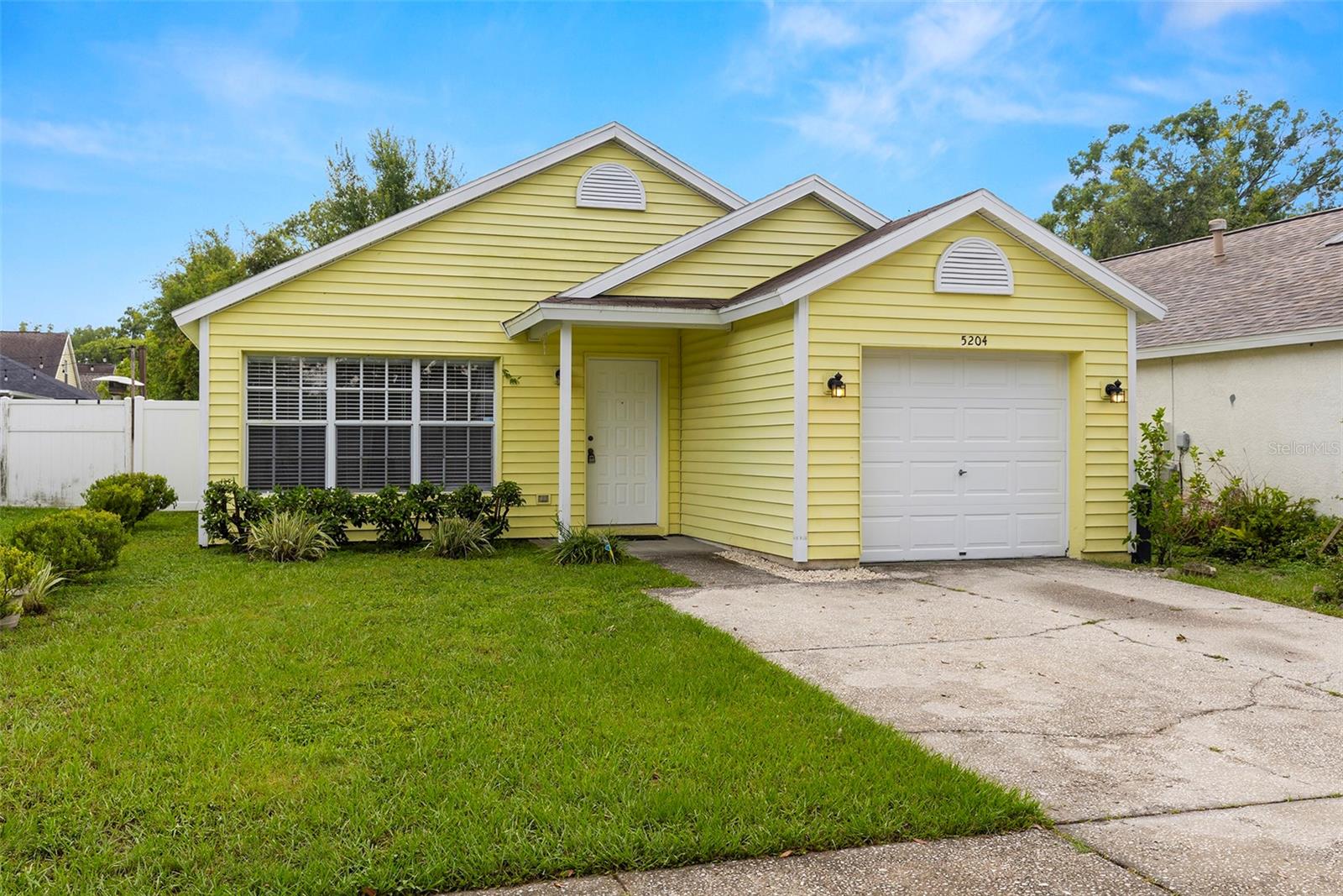 Welcome home to this charming 3-bedroom, 2-bath home offering 1,194 square feet of comfortable living space in a peaceful neighborhood. Featuring tile flooring throughout, this home combines low-maintenance style with functional design.
Enjoy two beautifully updated bathrooms, spacious bedrooms, and an open layout that invites natural light. The master suite features a spacious walk-in closet and a modern walk-in shower for your private retreat. Step outside to relax on the screened-in patio—perfect for morning coffee or evening unwinding—overlooking the fully fenced backyard, ideal for privacy, pets, or play. Located near Citrus Park Mall, Upper Tampa Bay Trail, Veterans Expressway, and a variety of shopping, dining, and entertainment options.