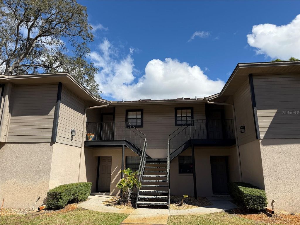 Photo of 4015 Ashford Green Place #D201, Tampa, FL 33613 (MLS # TB8485606)