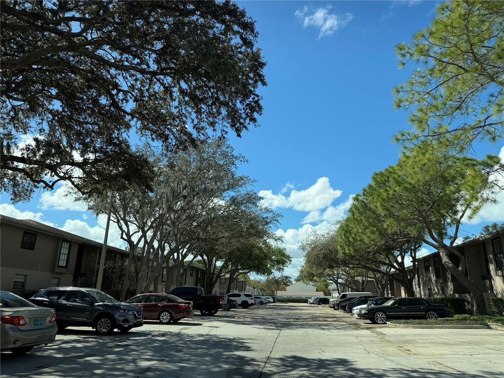 Photo of 4015 Ashford Green Place #D201, Tampa, FL 33613 (MLS # TB8485606)