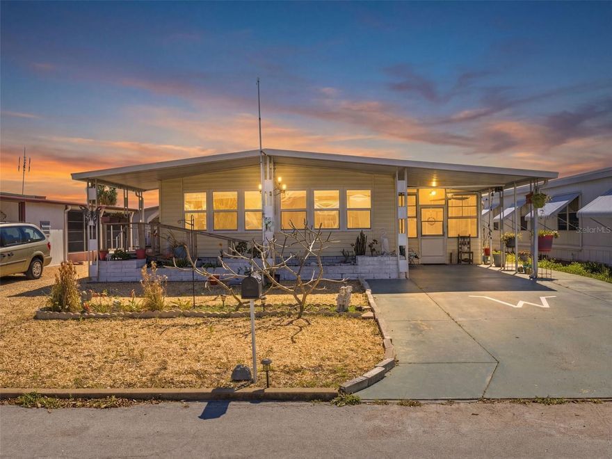 Lovely two two-bedroom two bath located in the popular 55+ community of Ponderosa Park! You can't beat the location which is centrally located and with a full undisturbed view with no home in front of your property. NO lot rent! You OWN your land! The age of the home still allows the buyer to obtain financing if needed. NO flood insurance is required! LOW HOA dues of $250.00 per year include an active clubhouse and a heated pool. Turn-key ready!! Open floor plan with 960 total sq ft of living space. Large bedrooms, both with walk-in closets. True master suite! The exterior of the home has vinyl siding for easy maintenance! Carport! Good-sized driveway for ample parking! Large shed with electrical and water, great for hobbies, workshop, extra storage, etc. Start enjoying that easy Florida lifestyle you have always dreamed about. Just minutes from the Gulf of Mexico, great shopping, restaurants, medical facilities, and much more!